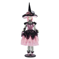 Katherine’s Collection Rosalie Blackthorn Doll 28-428140 front view, handcrafted Halloween witch with black lace, pink satin, and jeweled hat.