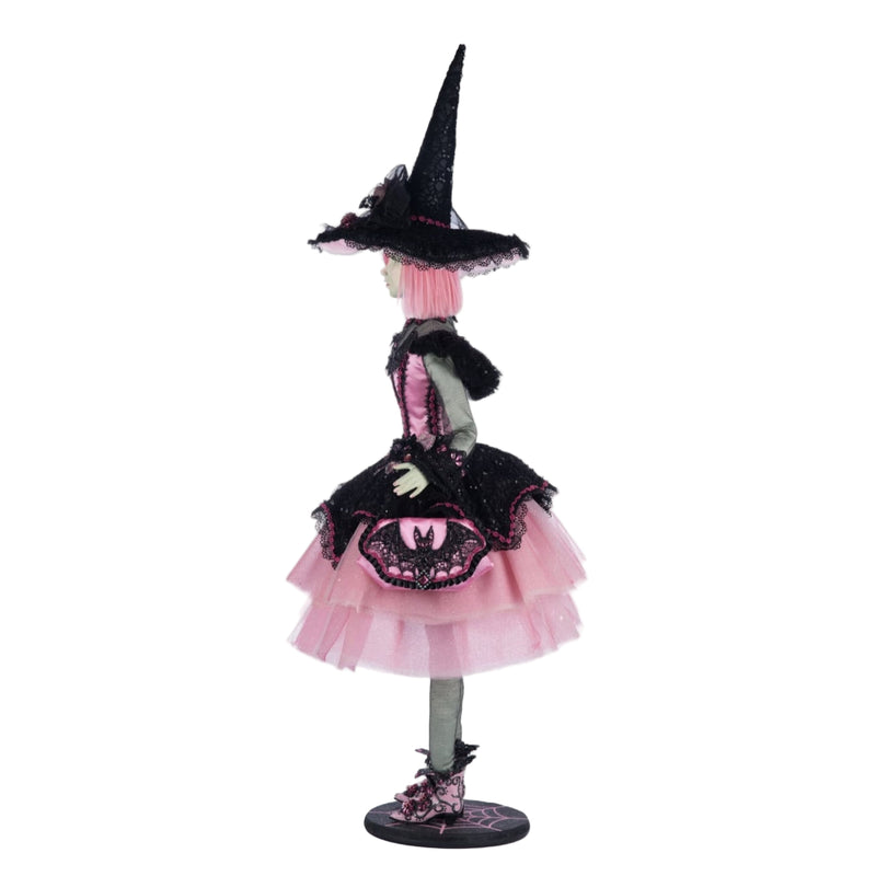 Left side view of Katherine’s Collection Rosalie Blackthorn Doll, Pink Panic Possession 2024, showing detailed hand-beaded black lace and pink tulle costume.
