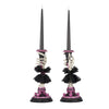 Detail of black battery-operated candle included with Katherine’s Collection Skeleton Hand Candle Sticks set