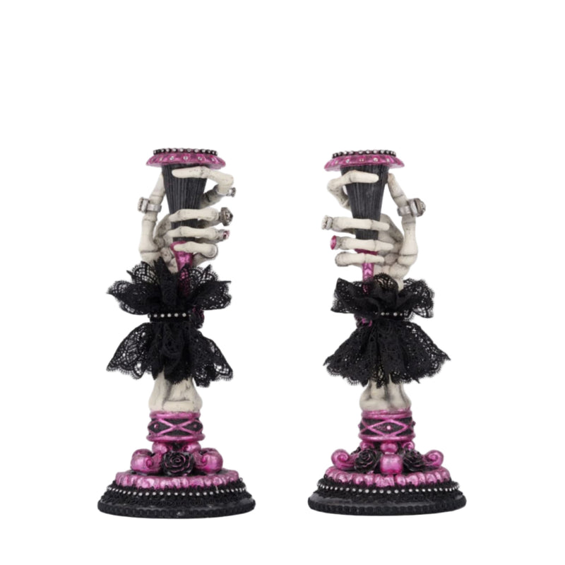 Skeleton Hand Candle Stick by Katherine’s Collection, front view with jeweled rings, lace sleeves, and rhinestones.