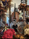 
Katherine’s Collection Skeleton Hand Candle Sticks set of 2 displayed on mantel, gothic Halloween home décor.