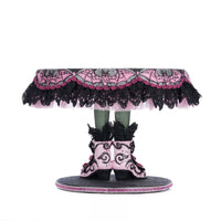 Back view of Katherine’s Collection Witch Boots Cake Plate, highlighting handcrafted details and beaded embellishments.