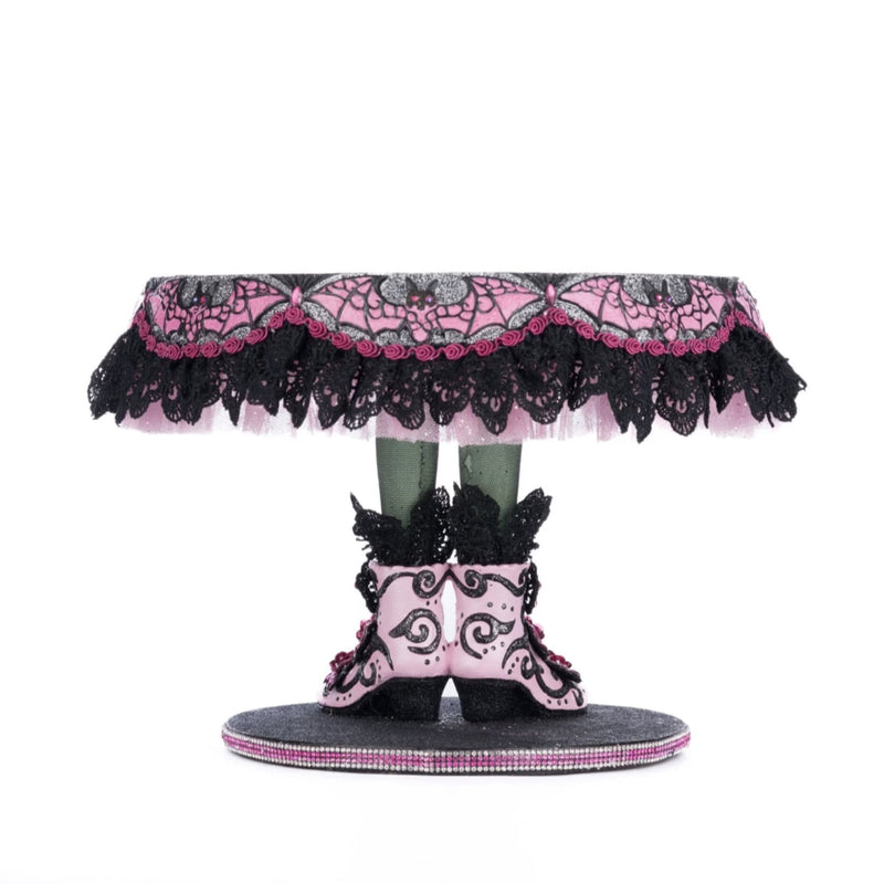 Back view of Katherine’s Collection Witch Boots Cake Plate, highlighting handcrafted details and beaded embellishments.