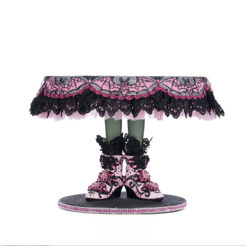 Katherine’s Collection Witch Boots Cake Plate front view, food safe resin dessert stand with jeweled bat wing design.