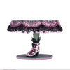 Left side view of Katherine’s Collection Witch Boots Cake Plate, showing hand-painted witch boot base with rhinestone accents