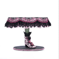 Right side view of Katherine’s Collection Witch Boots Cake Plate, showing hand-painted witch boot base with rhinestone accents.
