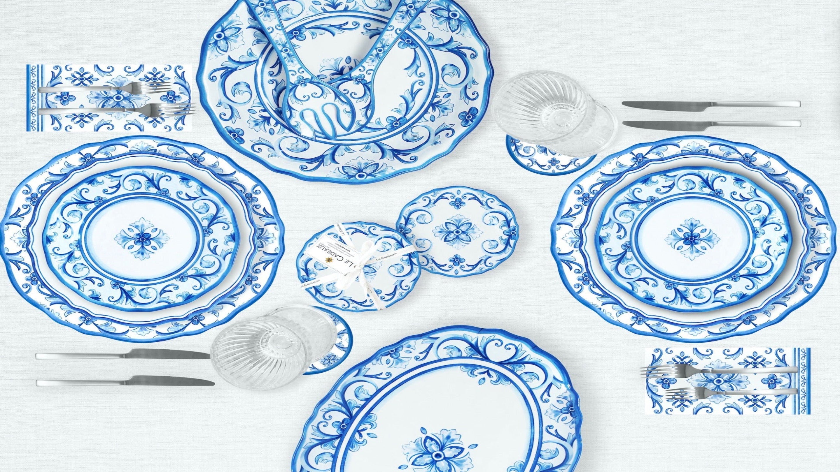 Le-Cadeaux-Mallorca-CollectionBlue and white ceramic dinnerware set on a white background
