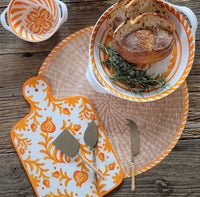 Mediterranean tablescape with Le Cadeaux Sicily Orange Cheeseboard and coordinating serveware