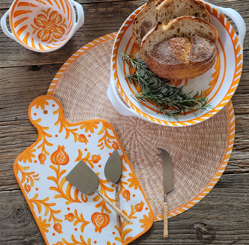 Mediterranean tablescape with Le Cadeaux Sicily Orange Cheeseboard and coordinating serveware