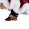 left side view of Katherine’s Collection Holiday Magic Mrs. Claus doll for festive décor close up of shoes