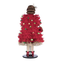 rear view of katherines collection handcrafted Holiday Magic Mae luxury doll with jeweled poinsettias and plaid dress.