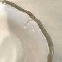 Close up of rim on the Le Cadeaux Rustica Antique White Cereal Bowls, SKU 233RUAW, GTIN 810266016208.